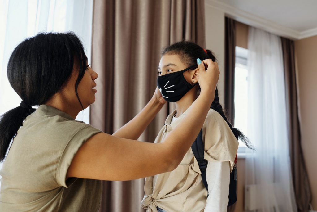 mom and daughter face mask hearing loss