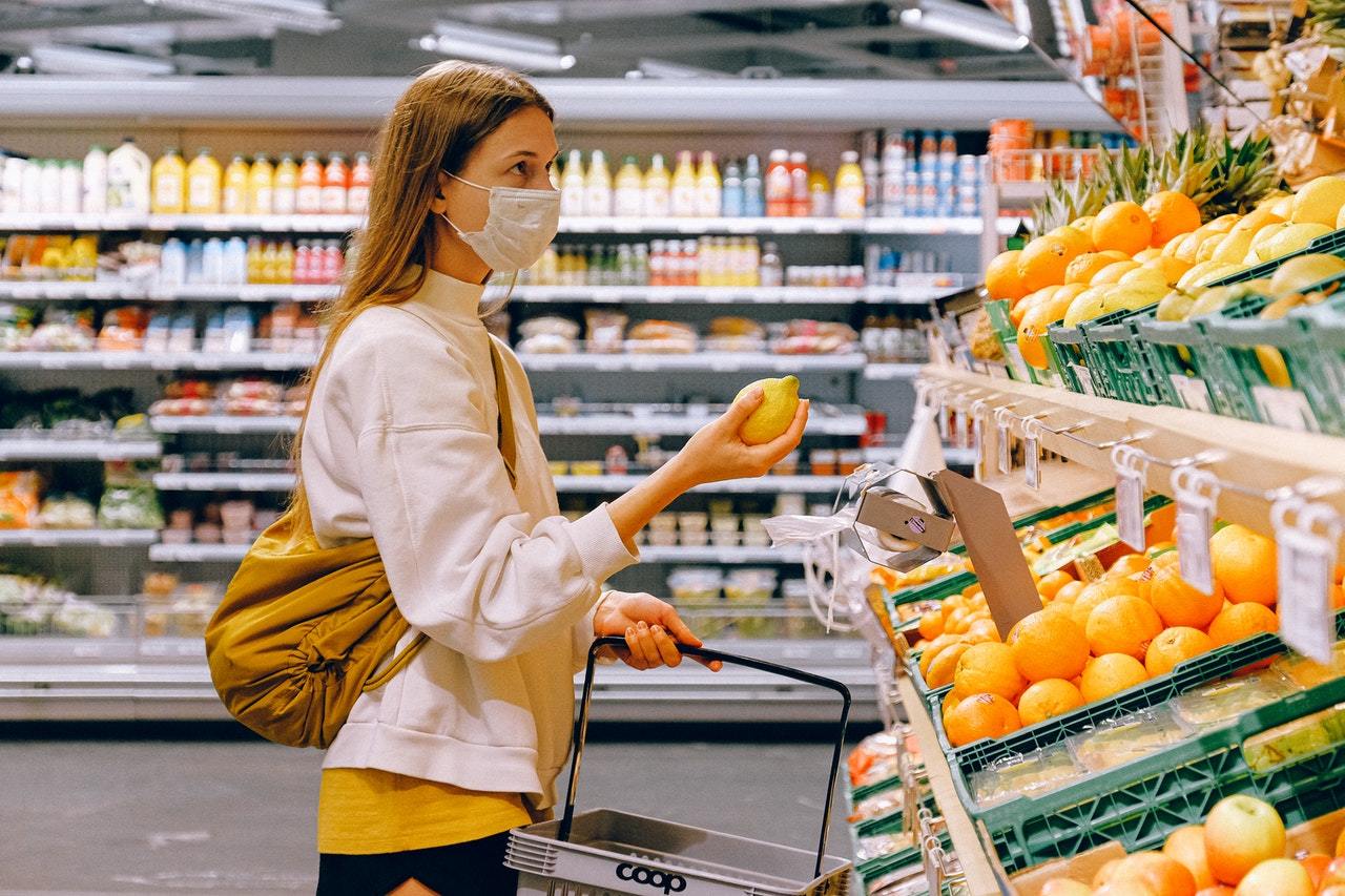 woman shopping with mask face mask hearing loss