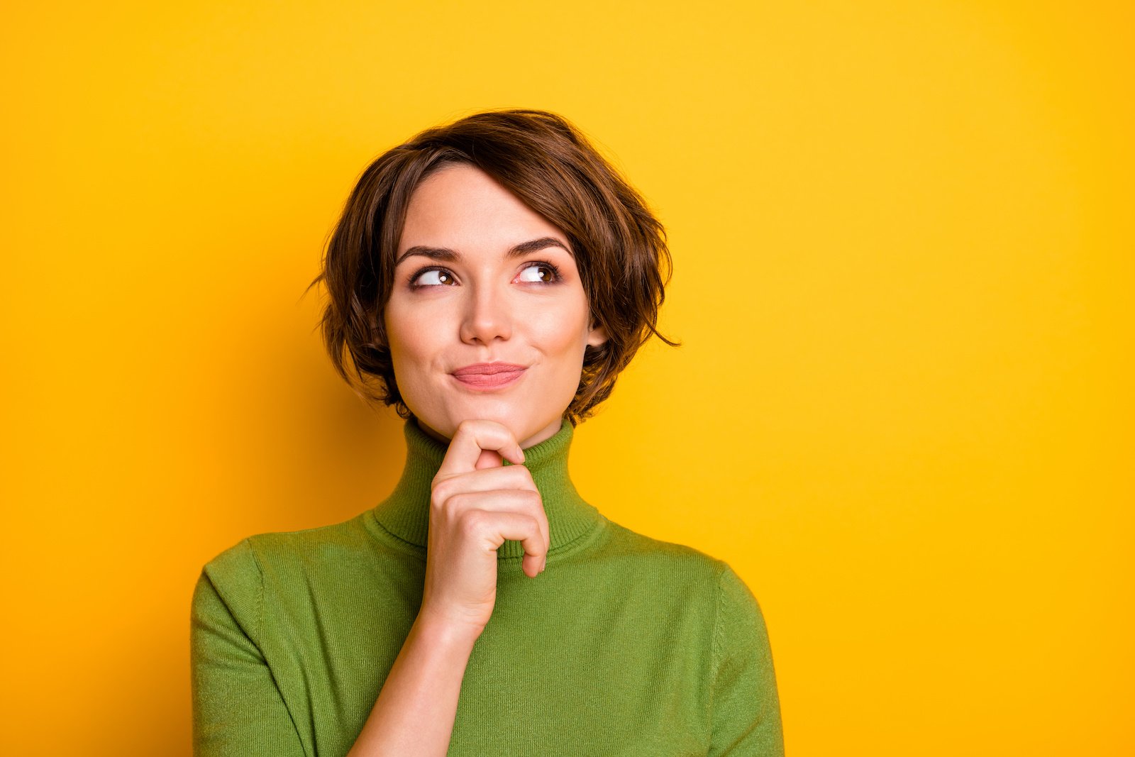 Woman Thinking About Hearing Aid Financial Support