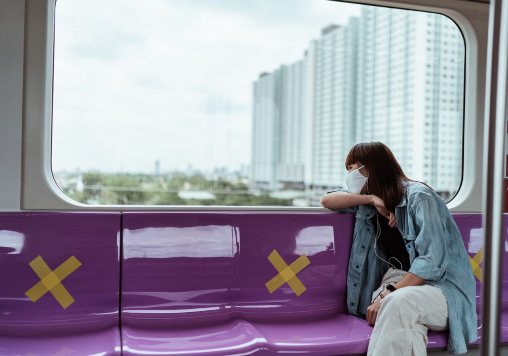 woman riding train unilateral hearing loss