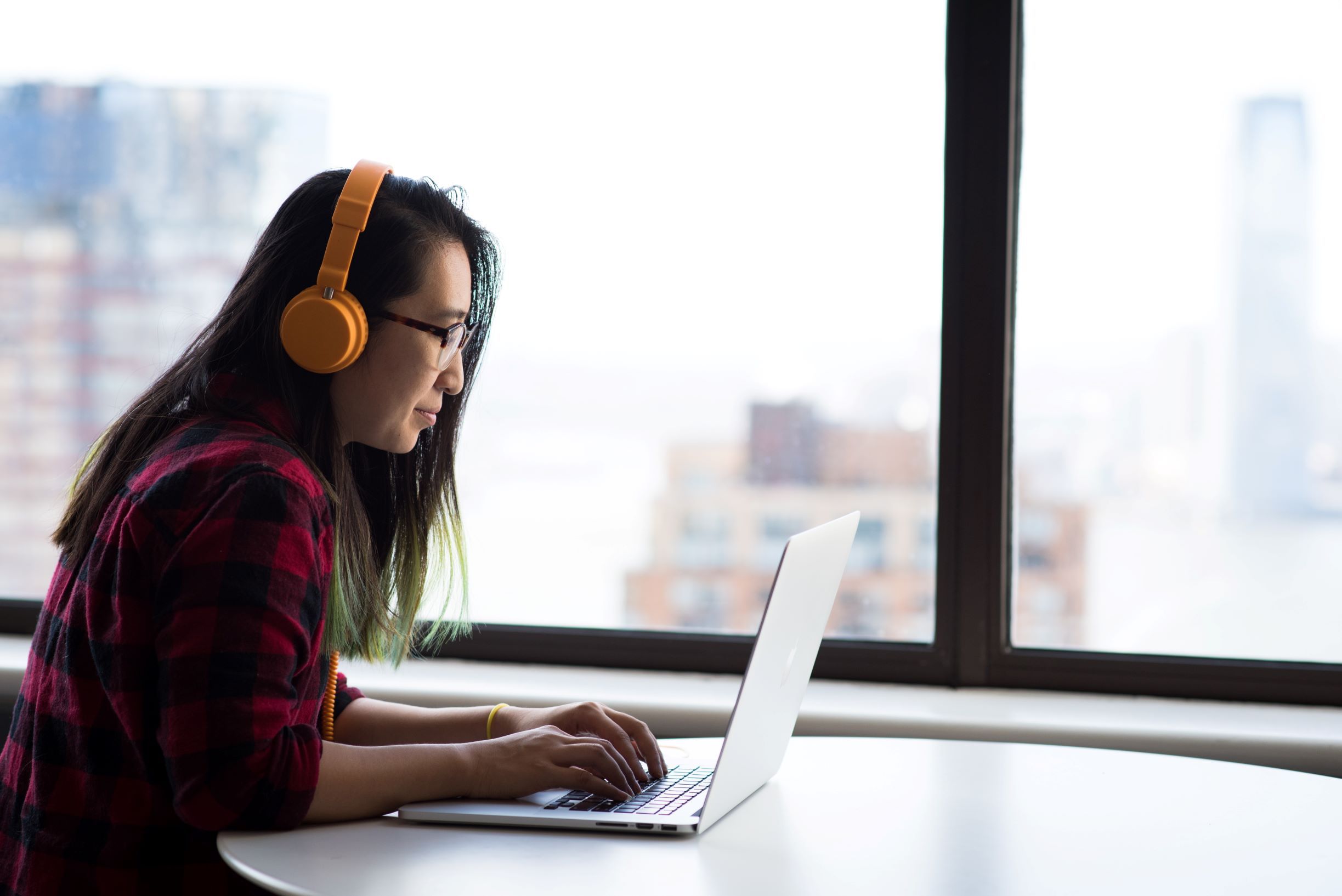 woman looking at laptop audiogram