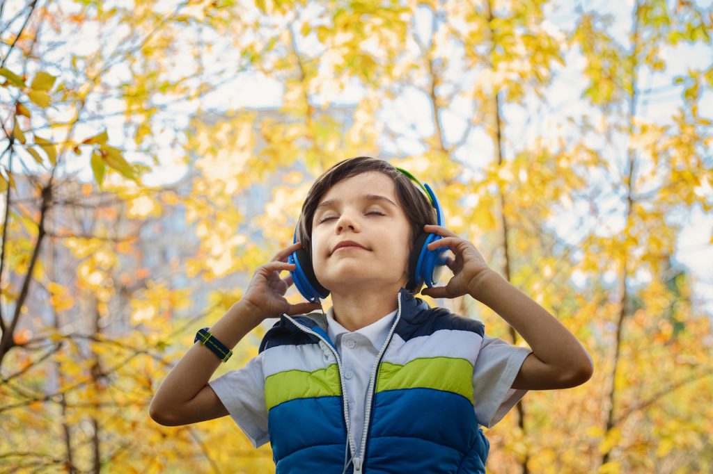 Boy Wearing Headphones Hearing