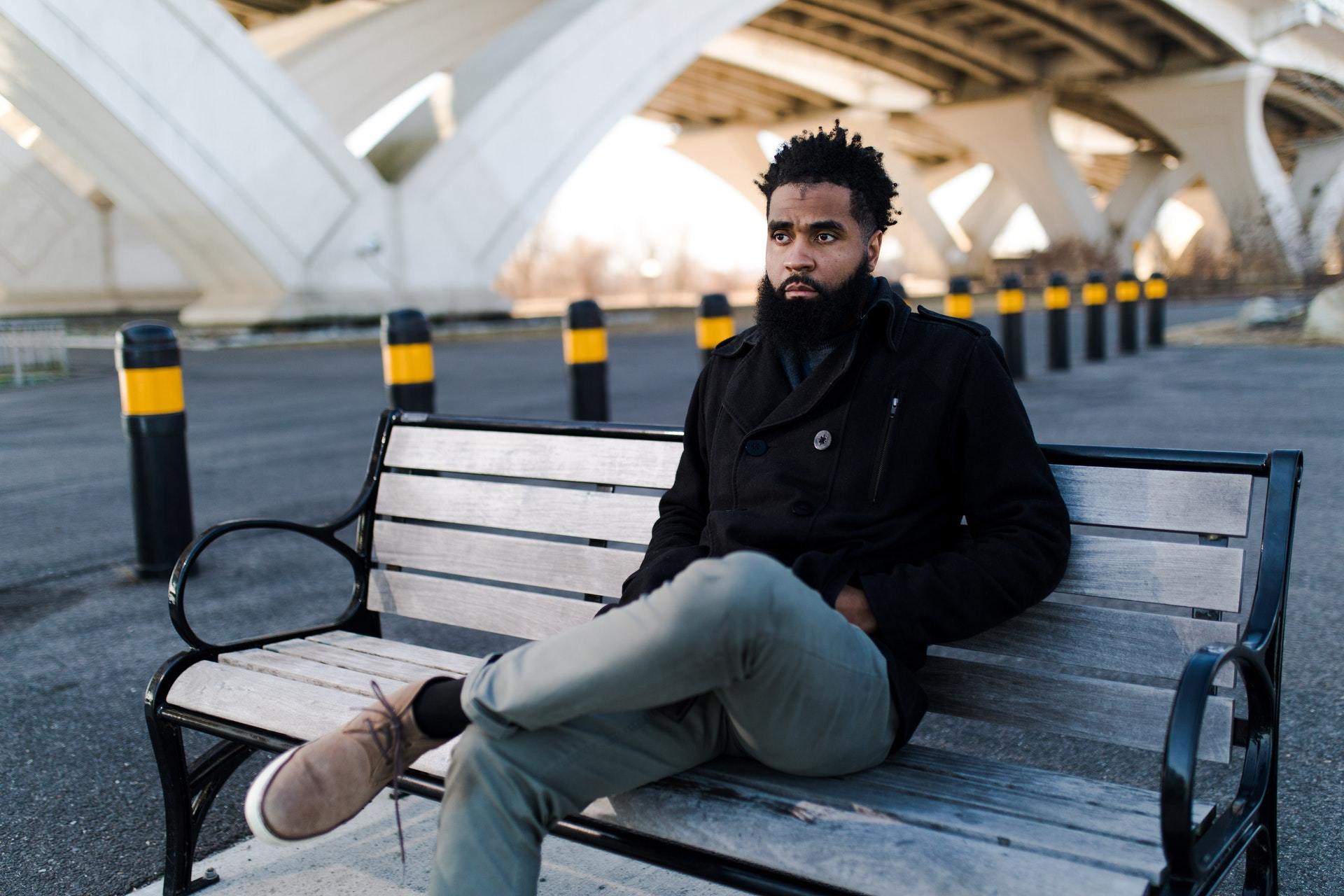 man on bench contemplating Meniere's disease