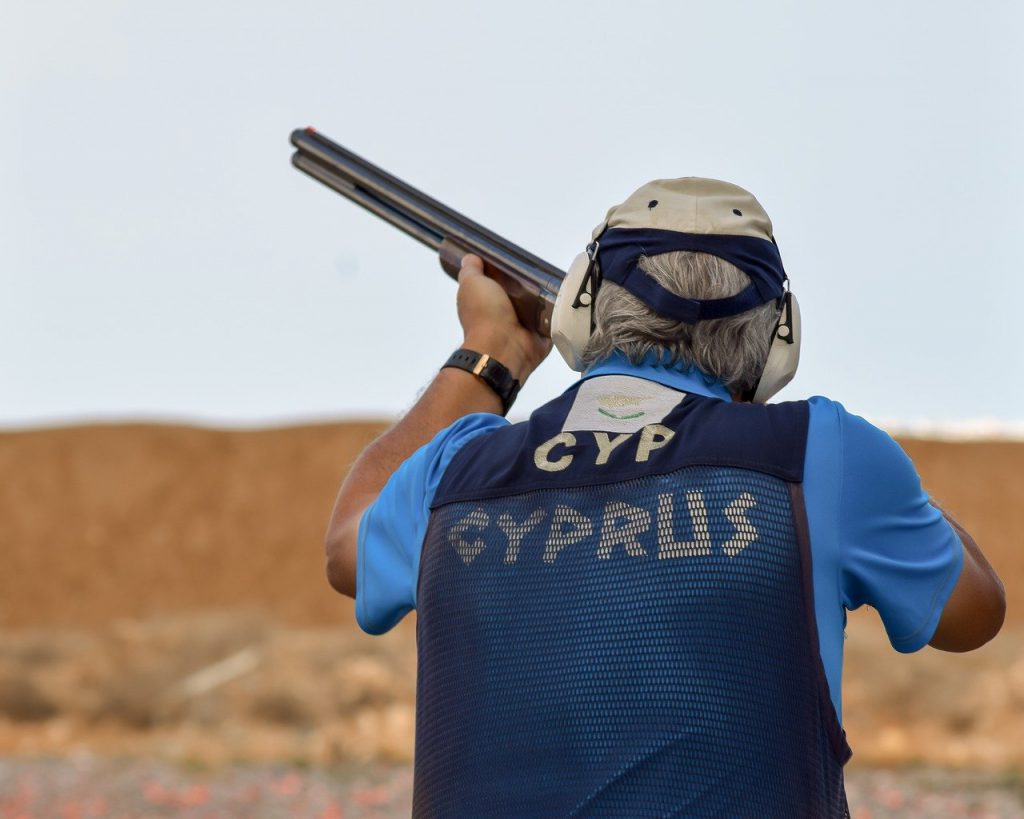 Man Holding Gun Hunter Hearing Protection 