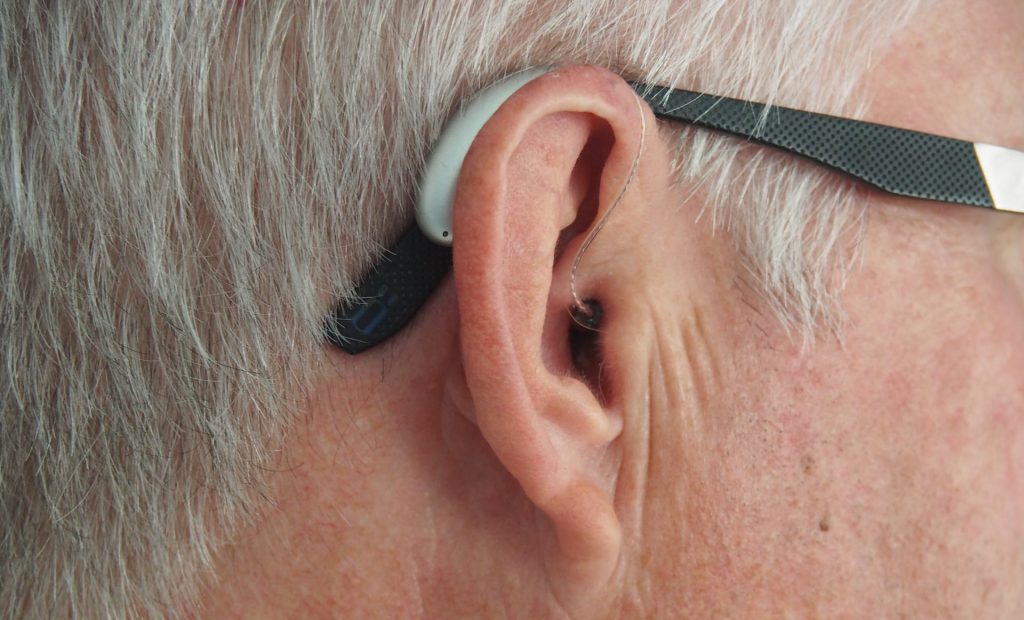 Man Behind The Ear Hearing Aid hearing aids glasses mask