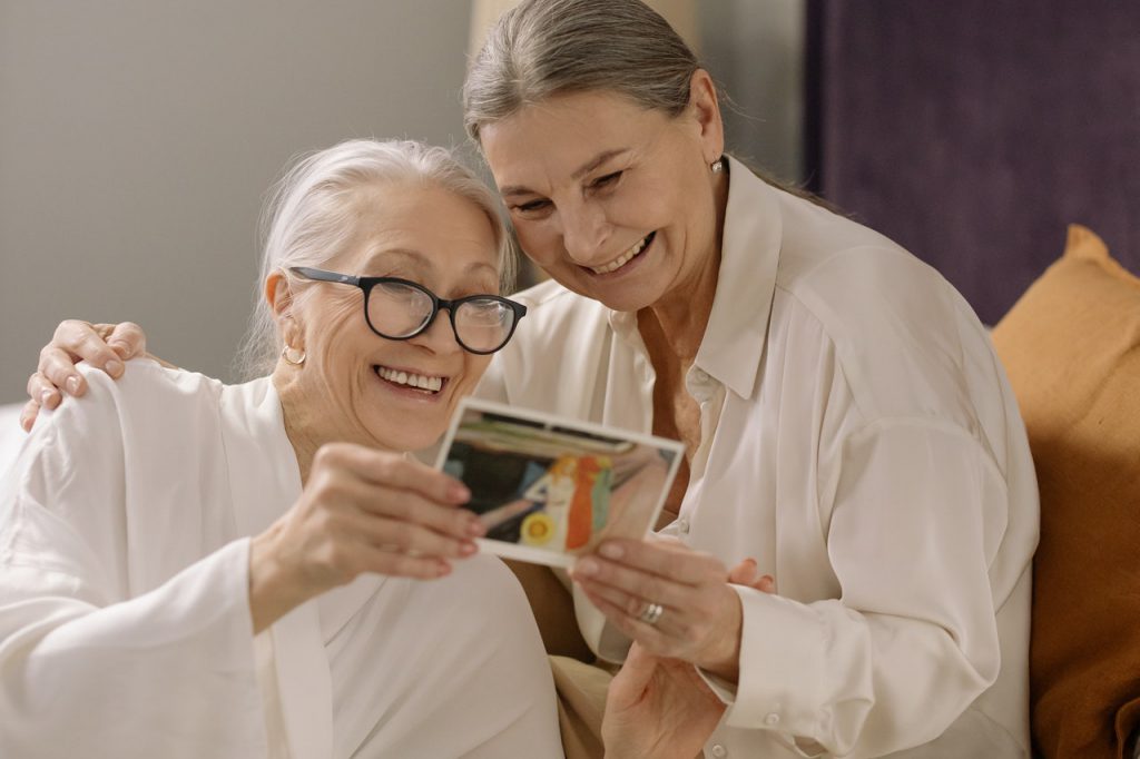 Two Woman Talking ITC Hearing Aids